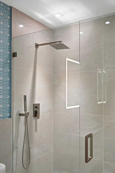 Amrit luxury residences glass enclosed rain shower