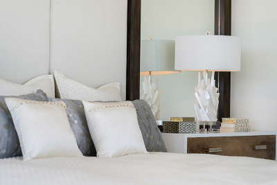 Custom luxury headboard and night stand in master bedroom